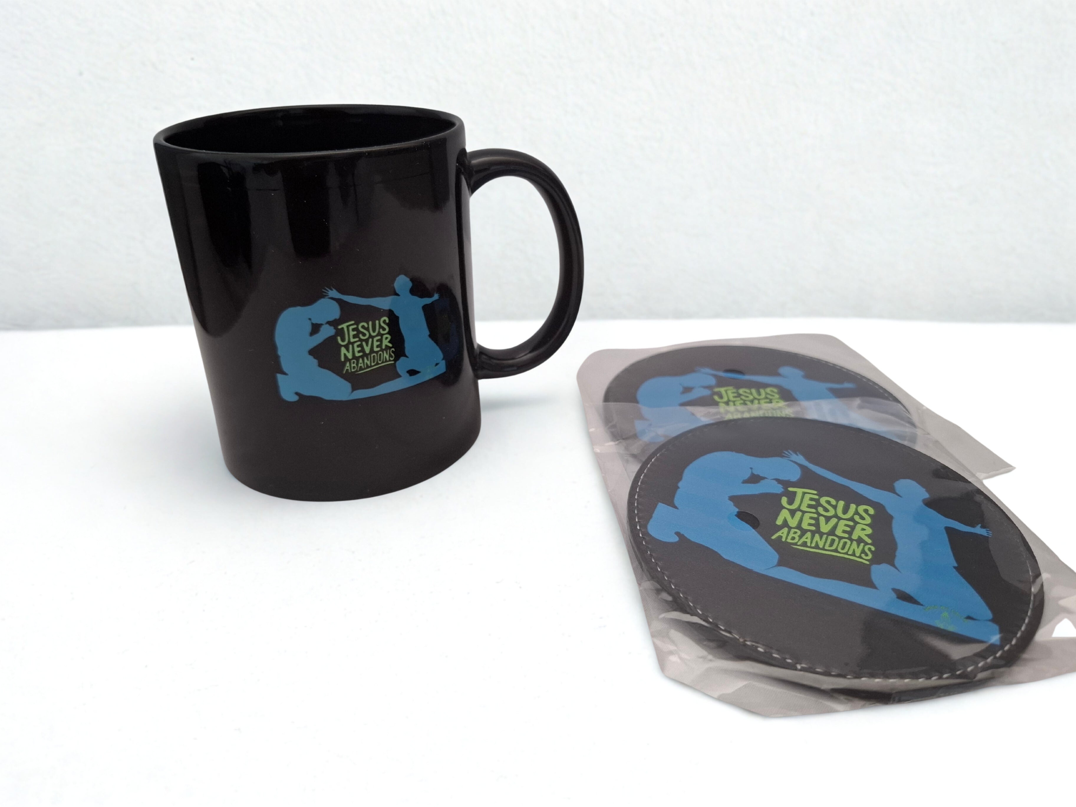 "Jesus never abandons"  mug and 2pc coaster set